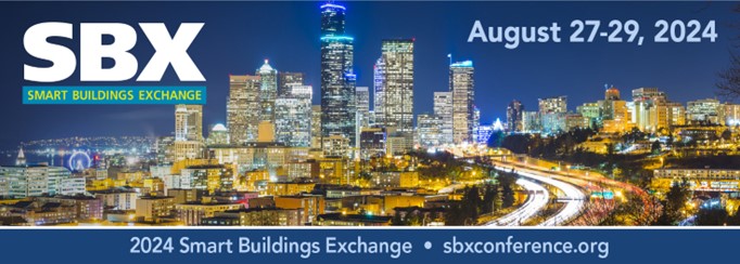 Image of Smart Buildings Exchange ad showing conference dates of August 27-29, 2024, against a nighttime photo of the City of Seattle's downtown buildings